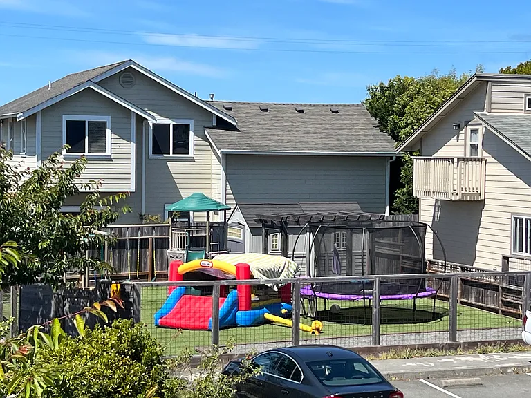 The private park across the street. View from master bedroom balcony. Only 8 homes in the cul de sac have access. Great house for a family