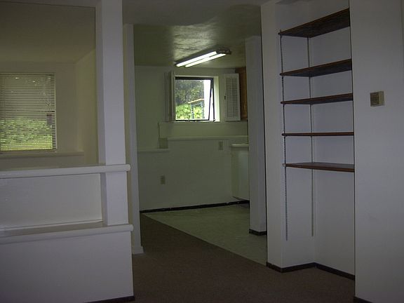 right side "bedroom" area, separate kitchen area