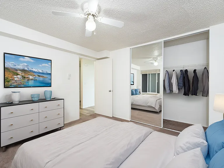 Comfortable bedroom layout with great closet storage and natural light.