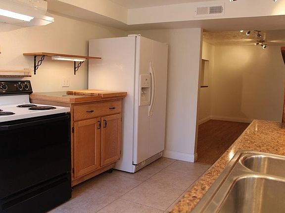 Another view of the kitchen and dining area.