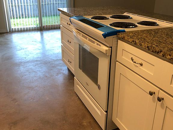 The kitchen also has a new stove / range, cabinets and granite
