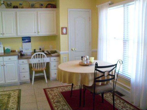 Breakfast nook in the sunny, cheerful kitchen!