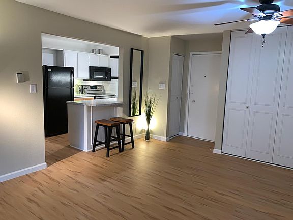 Dining area into kitchen and lg storage aeas