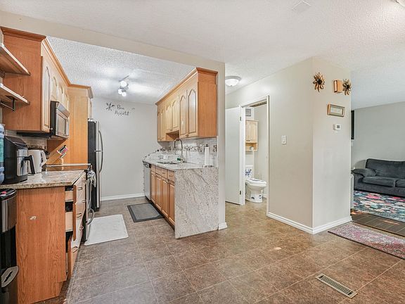 3rd image of 203 B Homestead Cres NW