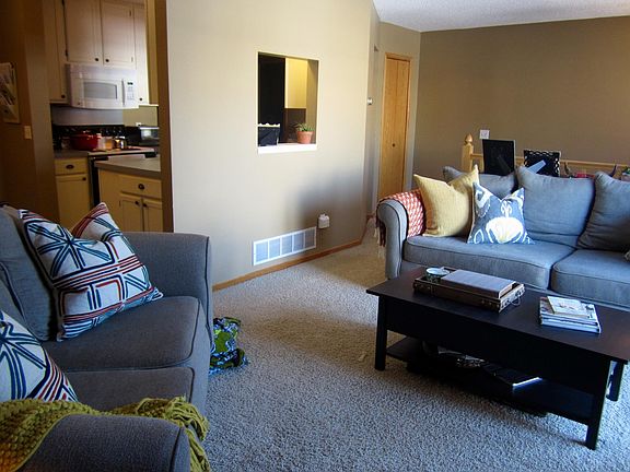 Large living room adjoins to dining room and open kitchen