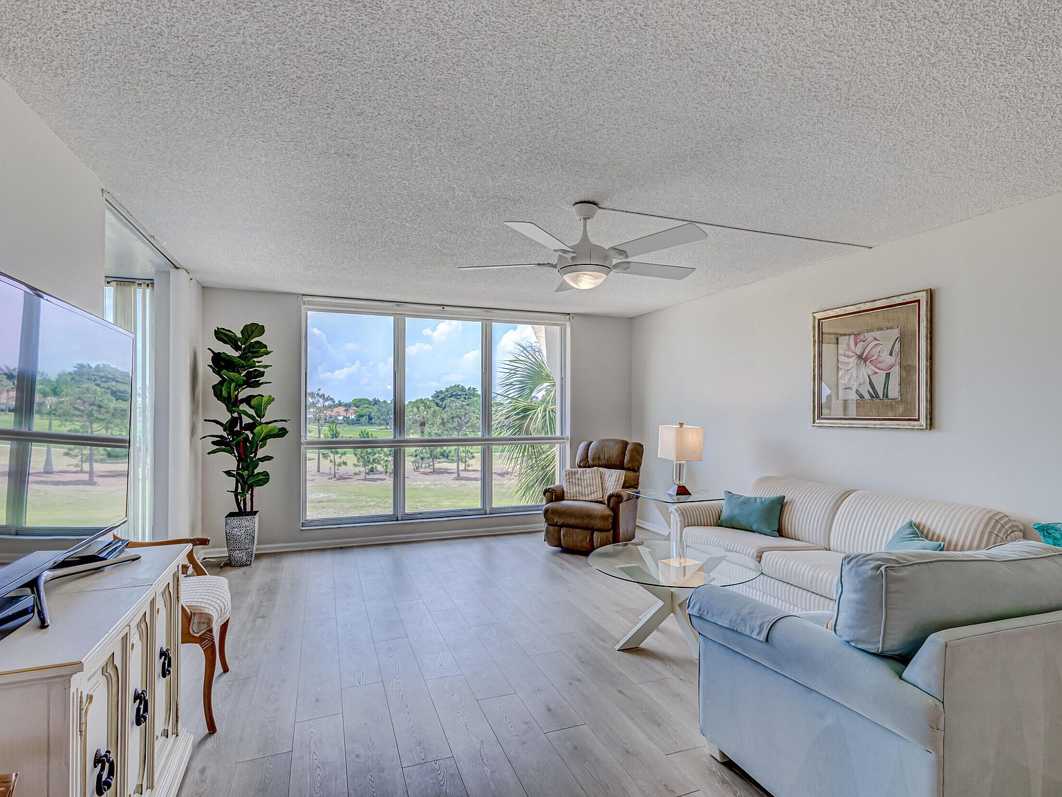 5390 Woodland Lakes Drive #305