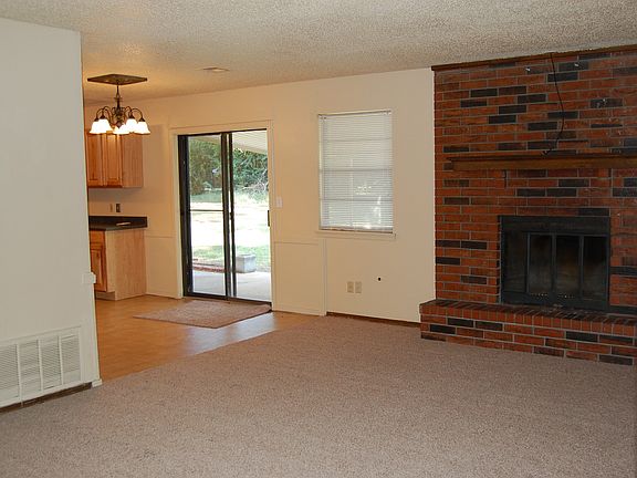 family and partial kitchen