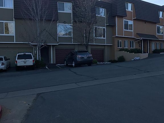 Front of condo, two garages