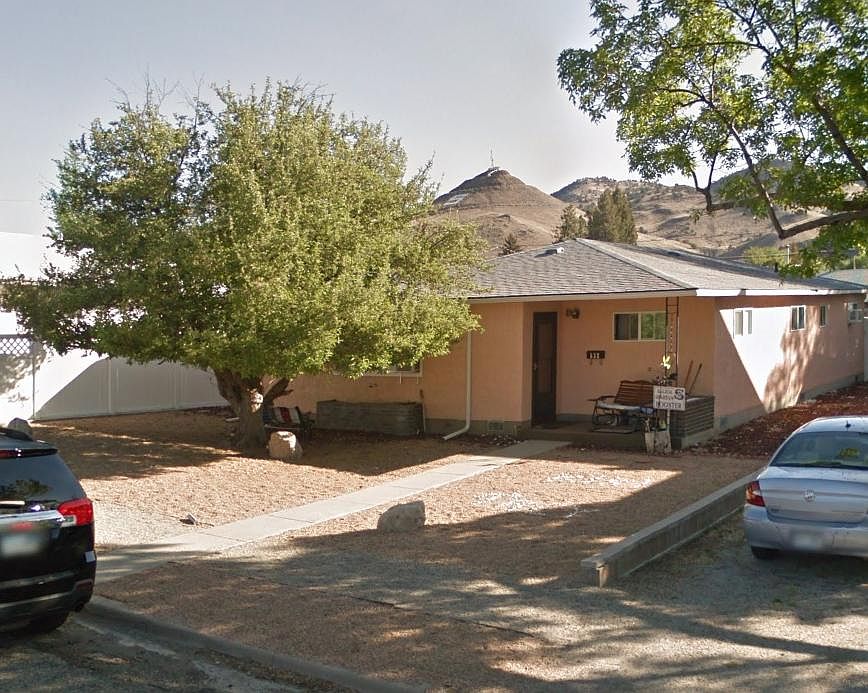 Front of house, yes it's pink, but it's a great home. Great porch for watching the day go by. "S" Mountain in the background. Apple tree in the front yard, Low maintenance. Close enough to walk to town and all of the buzz and funk of Salida. Trails minute