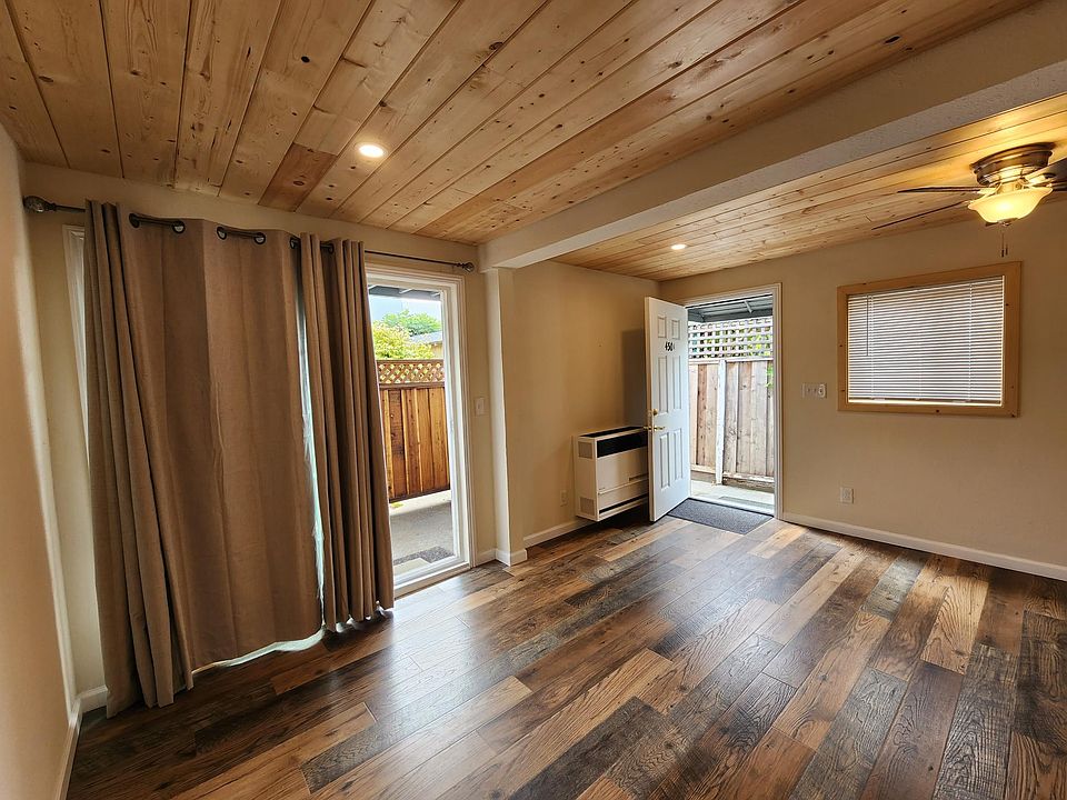 living room facing front door, patio