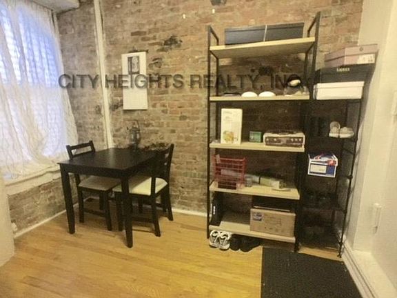 3rd image of 207 E 5th St APT 1A