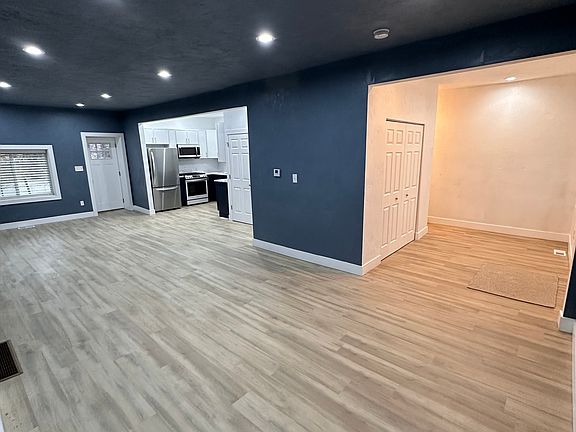 Living room into the dining and kitchen.