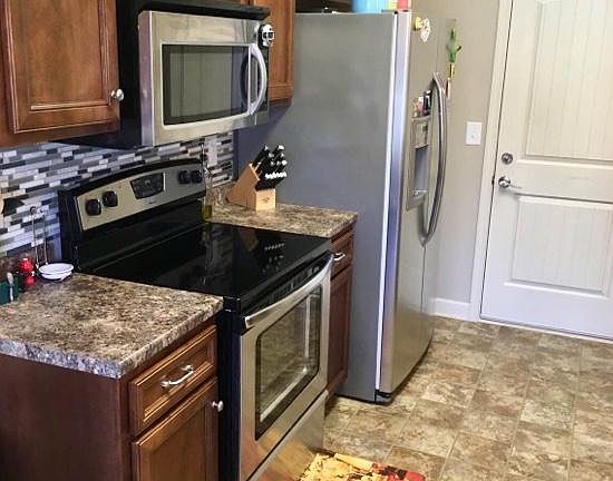 Kitchen with stainless steel appliances