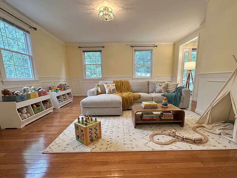 Virtually Staged. The main floor offers a formal living room with decorative fireplace, formal dining room, and cozy family room. The bright eat-in kitchen boasts stainless steel appliances, a BUILT-IN DESK, and sliders to a private deck and yard.