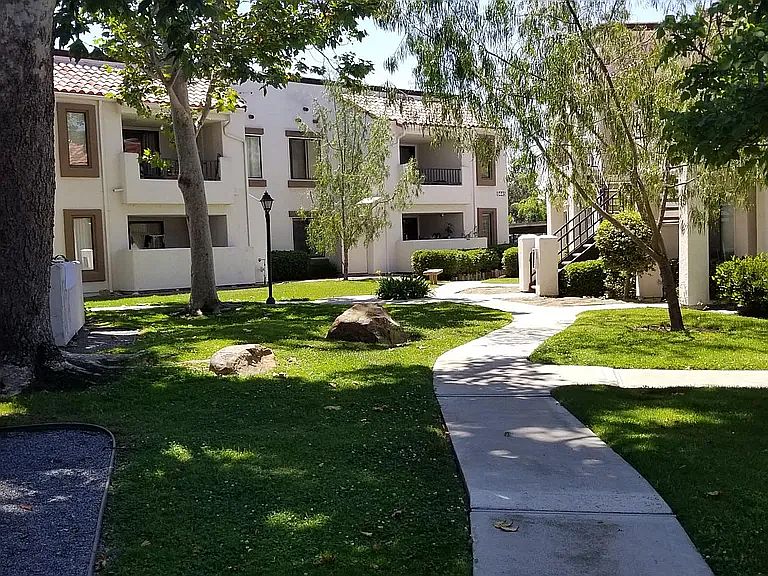Lot of green area outside the condo for the kids to play.