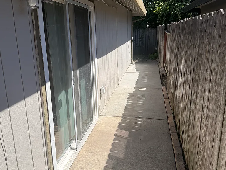 Cemented walkway side yard
