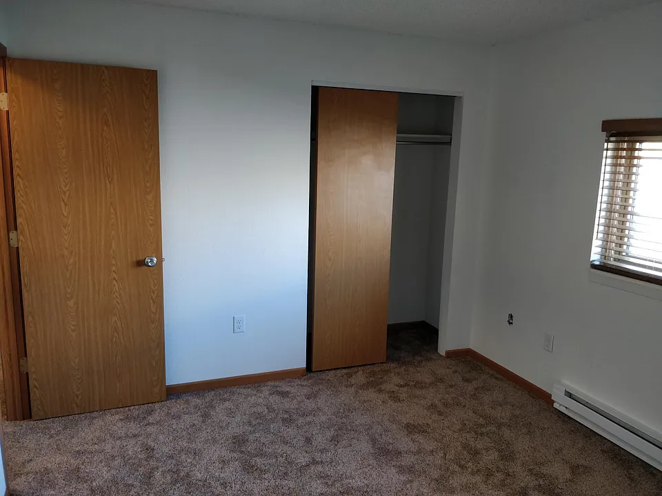Master bedroom with closet - easily fits a queen bed!