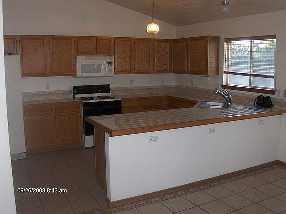 Spacious Kitchen with custom tile accents