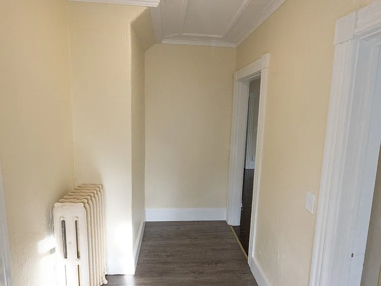 Welcoming entry foyer with convenient access. to living areas and bedrooms