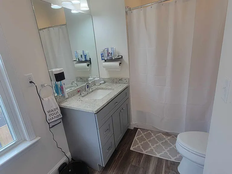 second floor bathroom with full tub