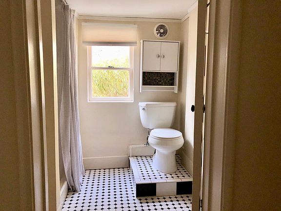 Bathroom with stall shower (6'3" ceiling).