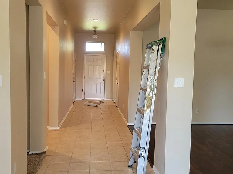 Long hallway with high ceilings.