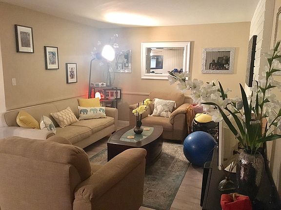 Gorgeous open floor plan living room with lots of lighting &