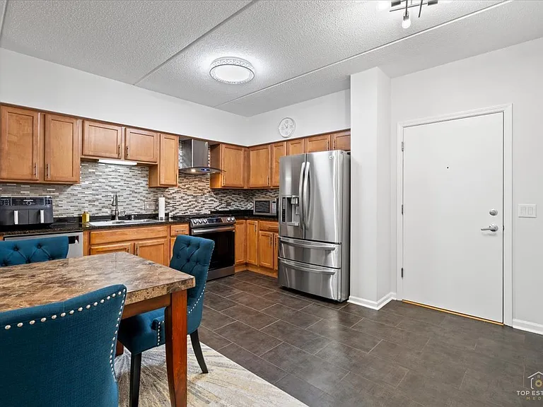 3501 Wellington Ct #203 — Photo 2