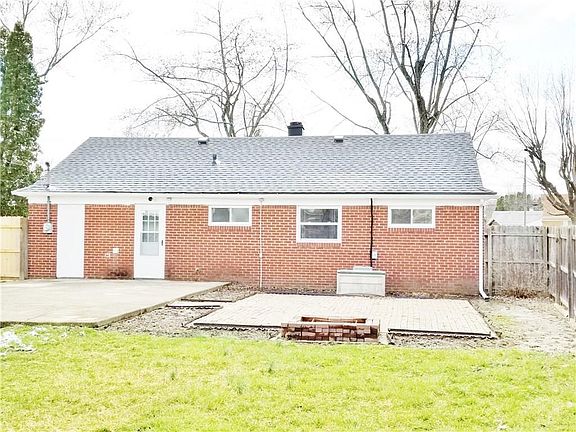 Rear view of home...2 huge patios complete with a fire pit!!  Just in time for spring....