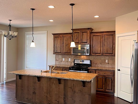 Kitchen with granite counters, pantry, all appliances
