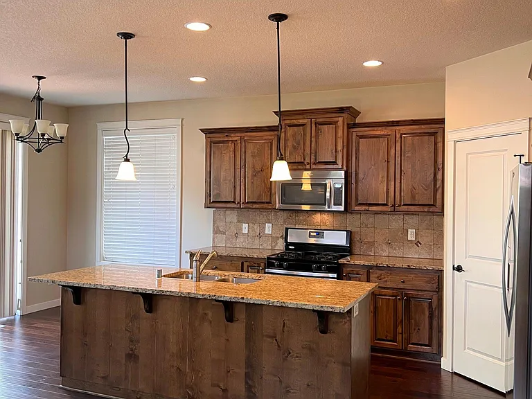 Kitchen with granite counters, pantry, all appliances