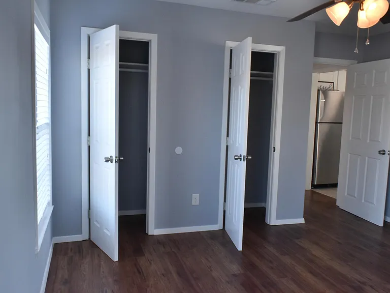 Bedroom leading to kitchen