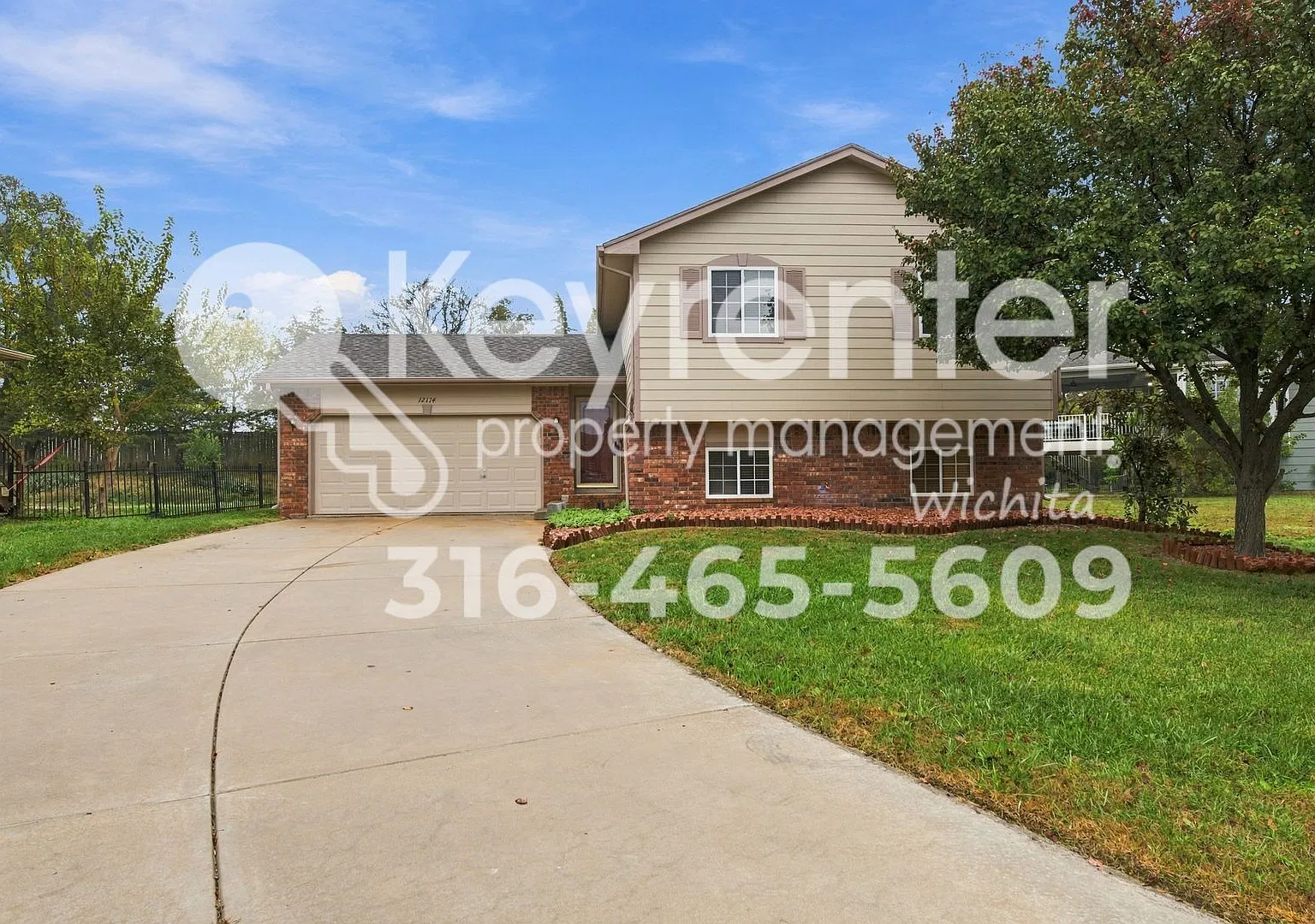Spacious 3-Bedroom Home with Finished Basement, Fireplace & 2-Car Garage — Photo 1