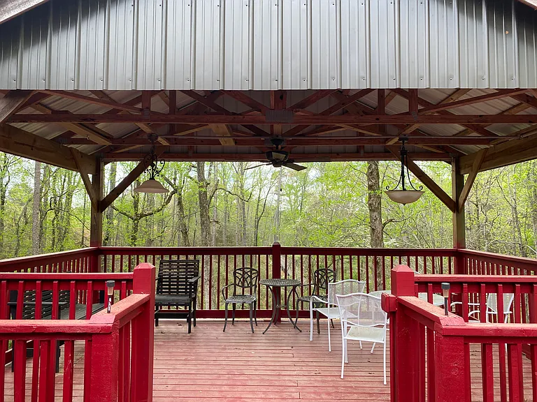 Covered deck overlooking woods