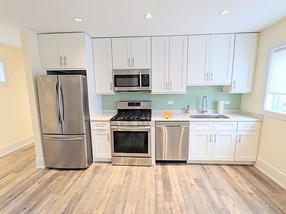 Stainless steel appliances. Dishwasher and garbage disposal included.