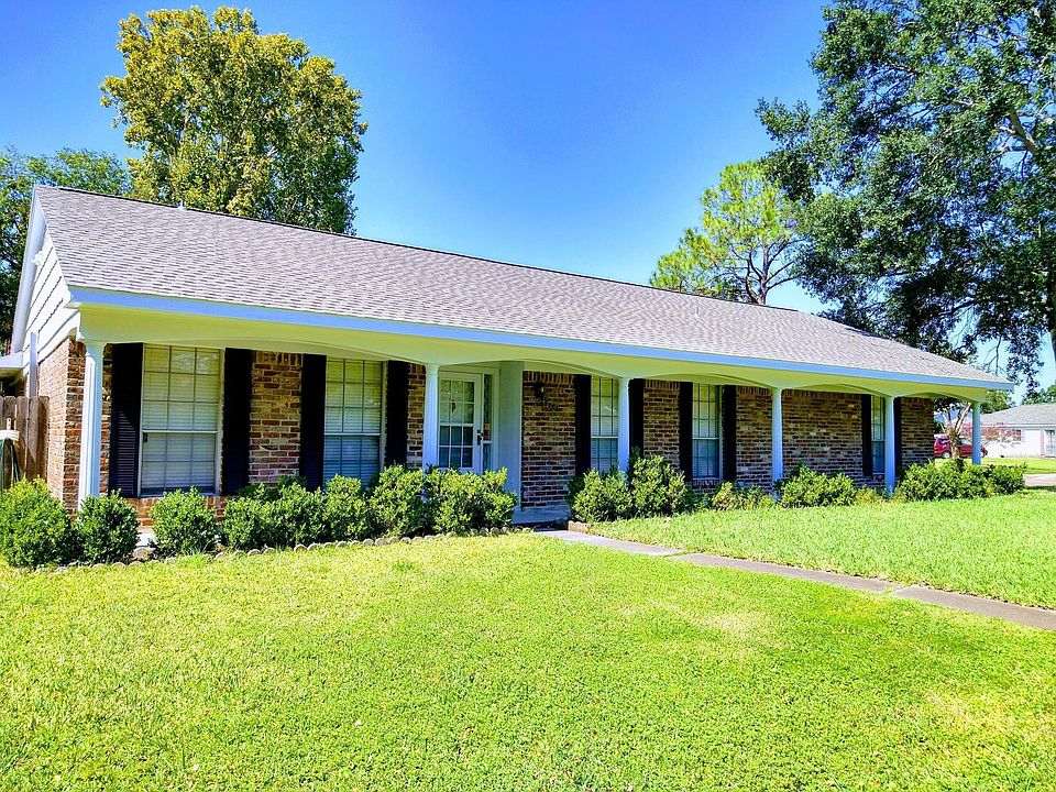 Wonderful curb appeal with petite and mature trees in front yard.