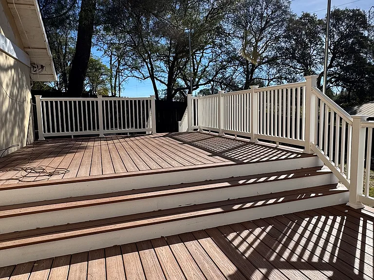 Large, well designed low maintenance Trex deck - seamlessly extending the backyard to the pool and cabana area