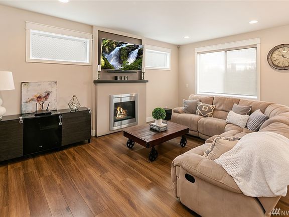 Inviting family room with cozy gas fireplace. 