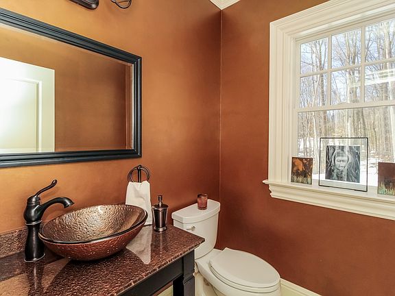 Powder room with glass vessel sink