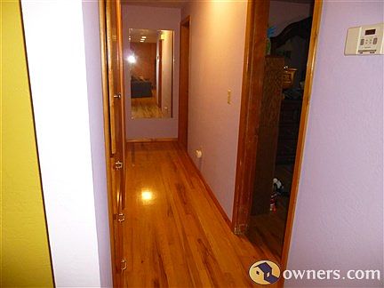 Hall way to bathroom and bedrooms.