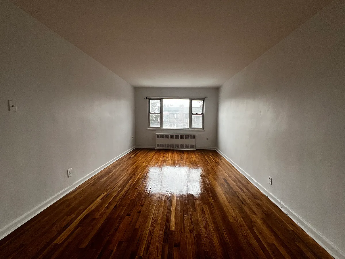 Building Photo - 61-12 70th St #2