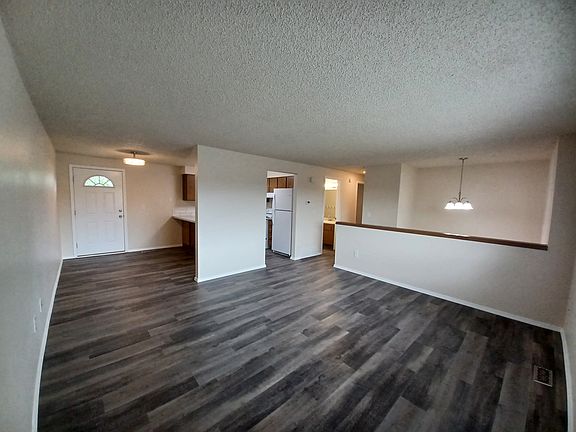 Living room looking towards the dining room and kitchen.