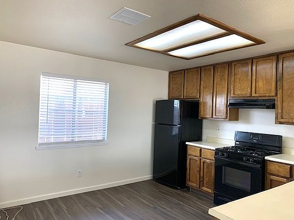Bright and spacious dine-in kitchen with all major appliances and ample storage.