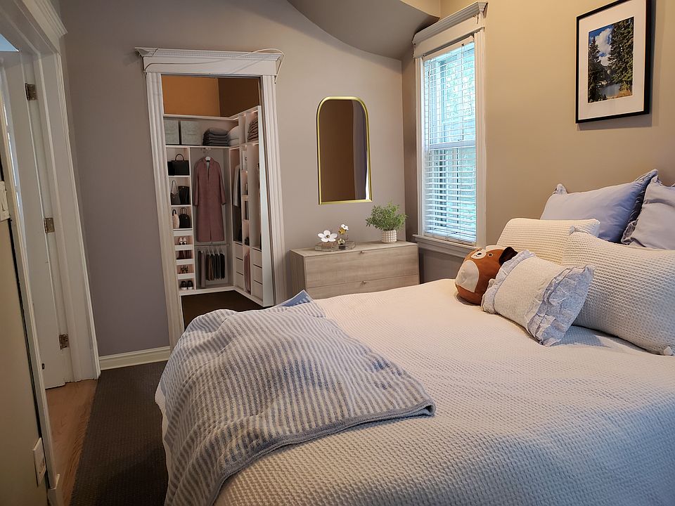 Primary bedroom with huge walk-in closet