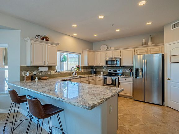 5th image of 10875 N 118th Way
