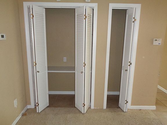 Storage in Family Room. Front Hall Closet and an additional closet for storage. Previous tenants used the larger closet as an "home office" desk for their computer which then could be conveniently hidden behind closed bi-fold doors when not in use.