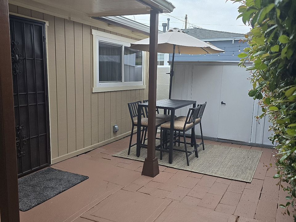 Private patio for dining, lounging, and entertaining. Plants love this space!
Outdoor shed for storage. Big enough for a bike plus other storage needs.