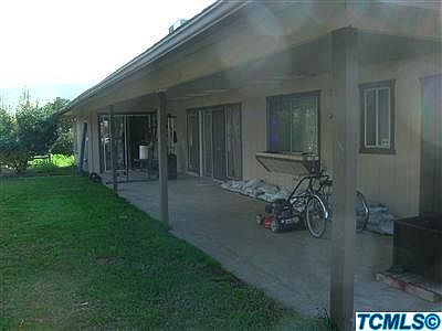 Covererd patio in the back yard of the Main House