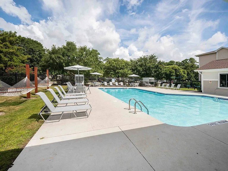 Sparkling Swimming Pool with a Sun Deck