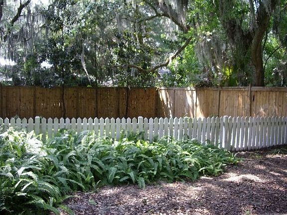 FENCED BACK YARD WAITING FOR FIDO!